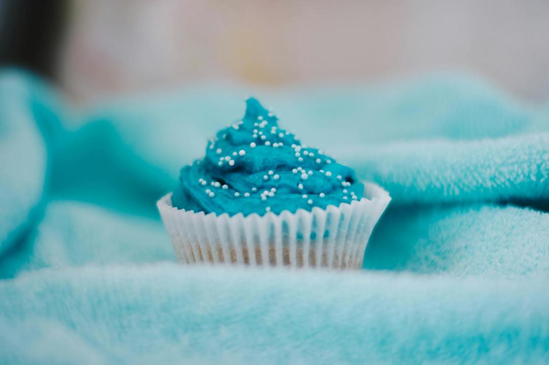 cupcake topped with blue icing